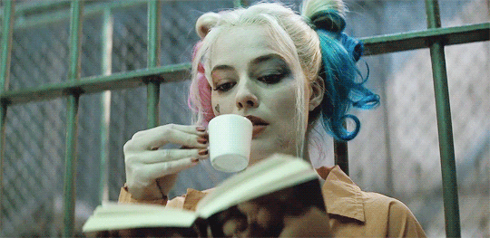 Harley Quinn drinking tea and reading a book in Suicide Squad movie