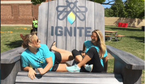 IGNITE Employees in a large chair