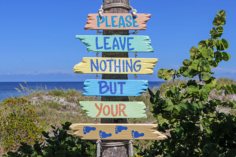 Leave nothing but your footprints sign