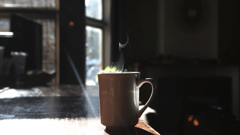 A steaming cup of coffee