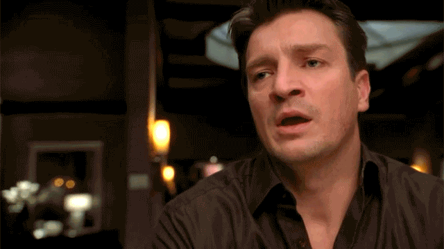 nathan fillion looks embarrassed and chooses to not speak