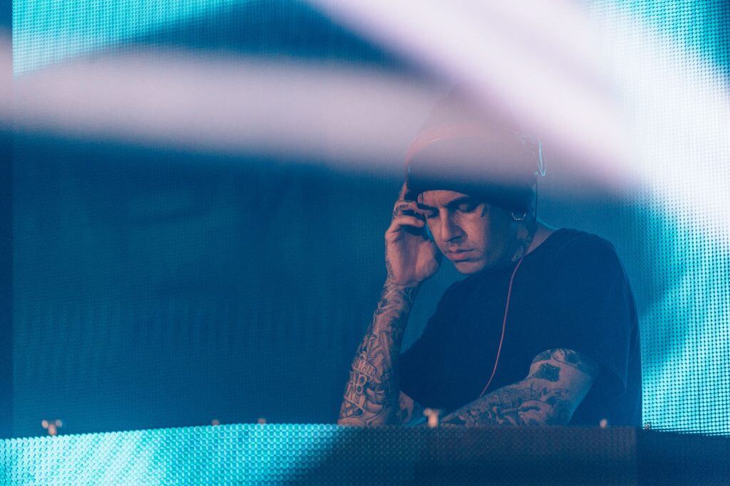 DJ Oscar Wylde making music on stage at Humber College Frosh