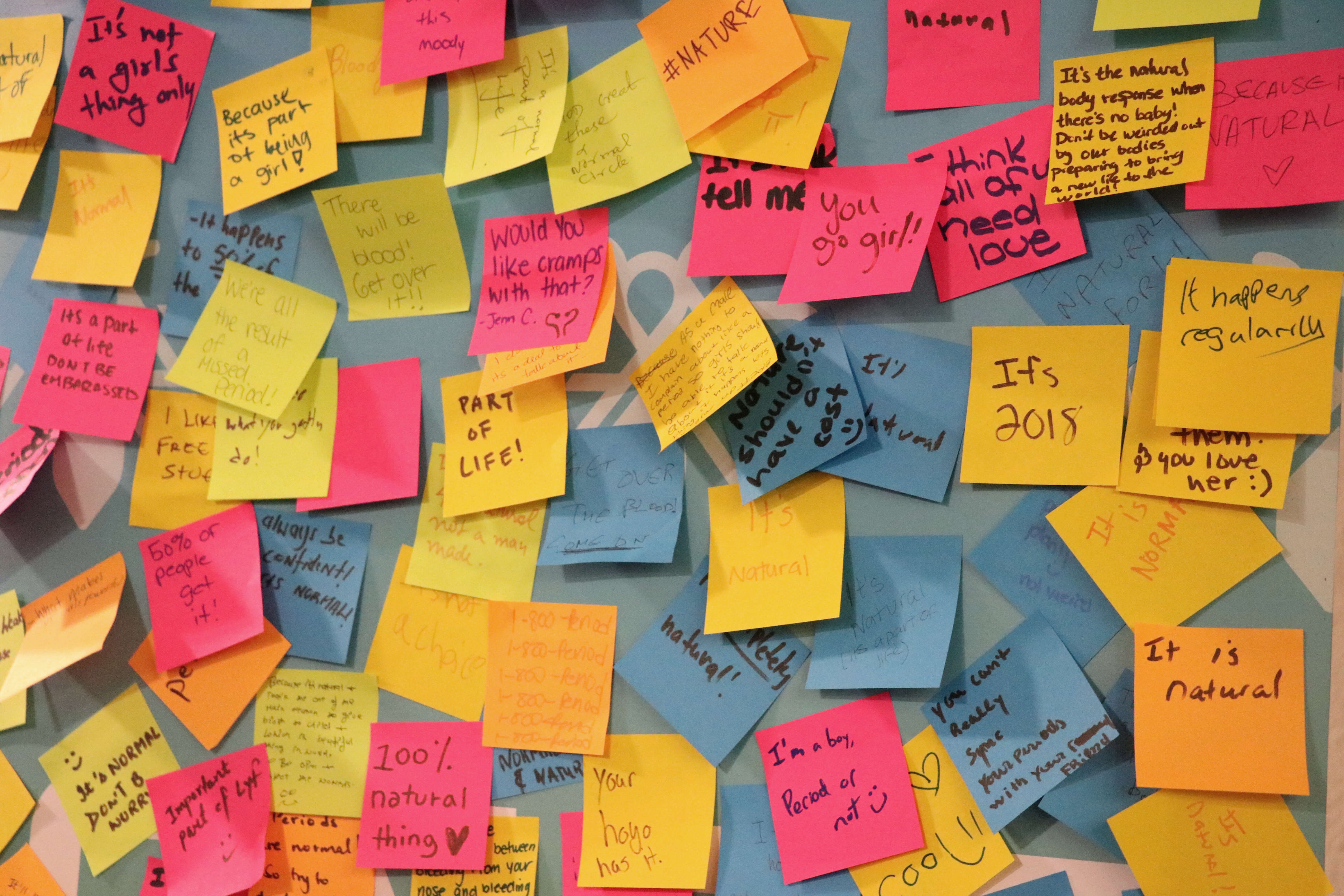 Sticky notes with positive period comments