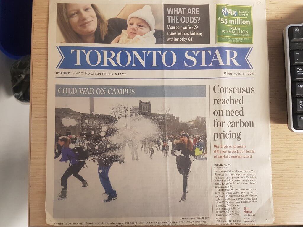 A Toronto Star newspaper featuring a front page story about a student snowball fight at U of T.