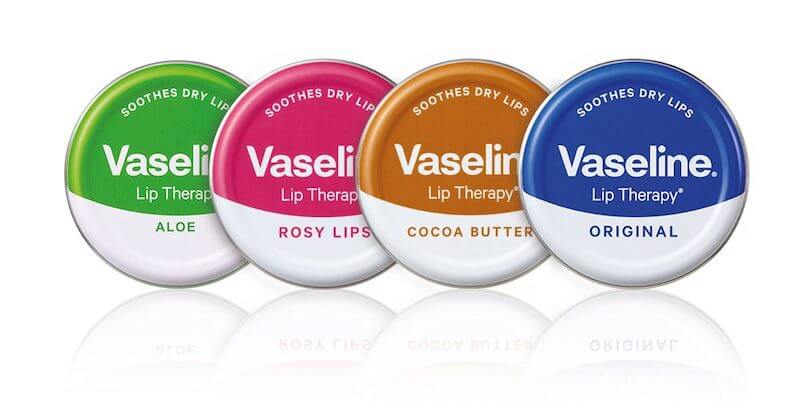 Four tins of Vaseline lip Therapy