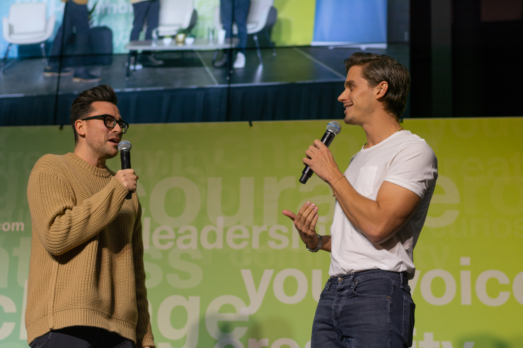 Dan Levy and Antoni Porowski chat on stage