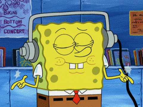 Spongebob Squarepants listening to music through headphones and snapping his fingers.