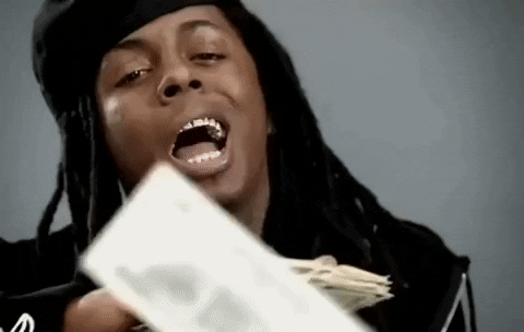 Gif of rapper Lil Wayne "making it rain" by tossing paper bills at the camera.