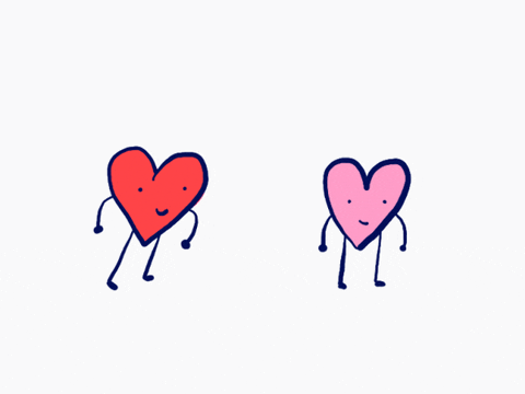two cartoon hearts share a loving embrace.