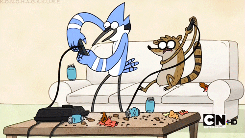 Rigby and Mordecai from Cartoon Network's, "The Regular Show," feverishly mash buttons on video game controllers while sitting on a couch in front of a coffee table covered with garbage.