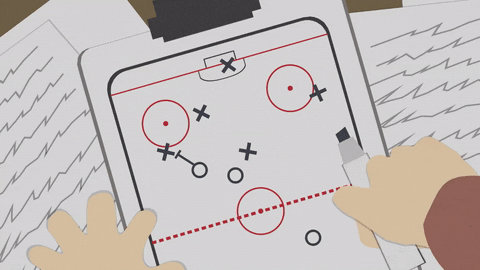 Eric Cartman from "South Park" draws a game plan on a hockey rink board.