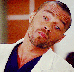 Close-up of actor Jesse Williams as Jason Avery on ABC's "Grey's Anatomy" looking impressed and nodding his head. 