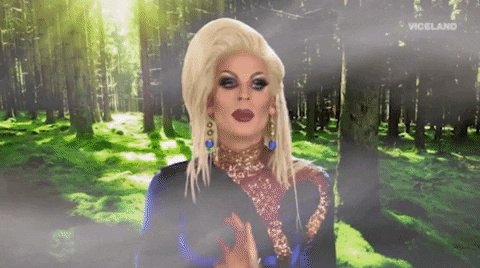 Gif of drag queen Katya Zamolodchikova in a forest saying, "Imma take time for me."