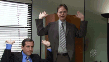 Gif of Michael Scott and Dwight Schrute from the TV show, "The Office," dancing with their hands in the air.
