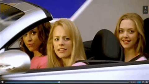 Rachel McAdams as Regina George in "Mean Girls" (2004) sits in a car while saying, "We're going shopping."