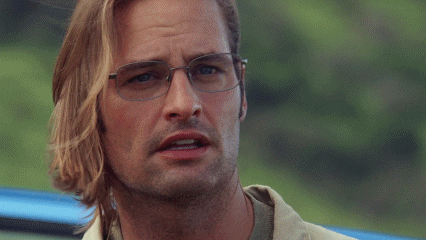 James "Sawyer" Ford from ABC's "Lost" takes off his glasses as his mouth hangs open in awe.