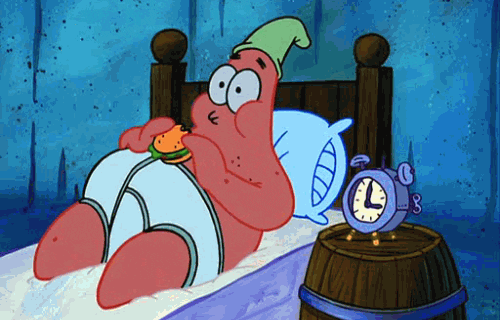 Patrick Star eating hamburger in bed