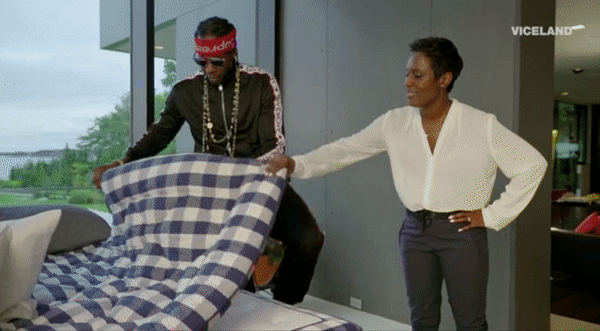2 Chainz lays in a horse hair bed.