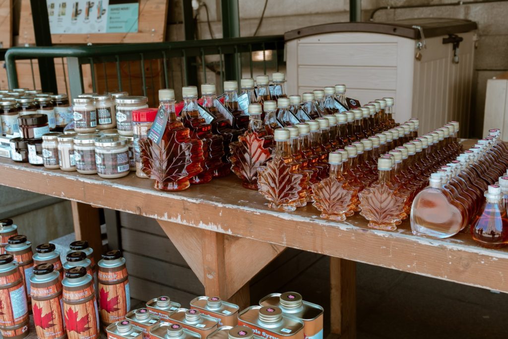 Shelves of Canadian maple syrup in jars