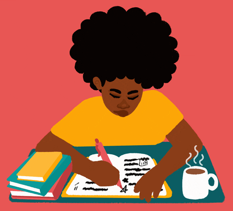 Girl writing in a notebook with a hot coffee on the side.