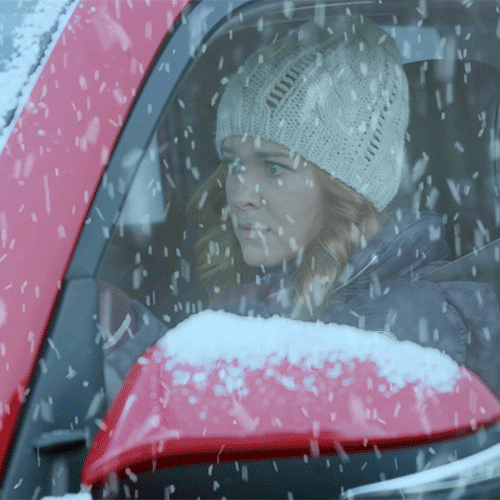 woman snowed in her car