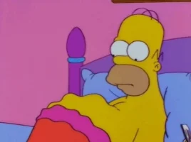 Homer Simpson looking at his stomach growl due to hunger.