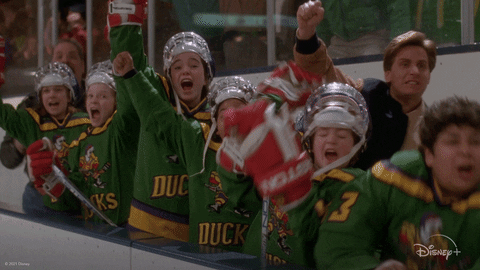 Youth hockey team cheering.