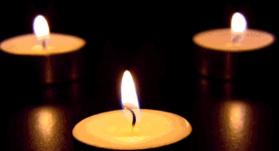 Three lit candles.