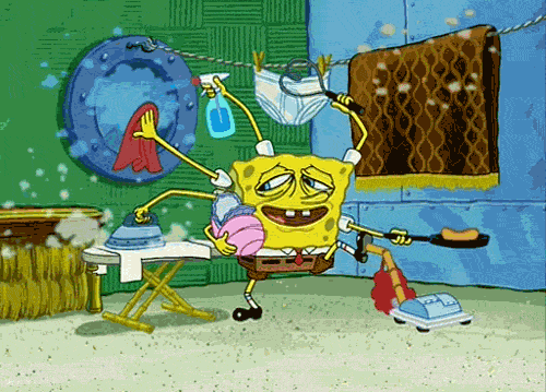 Spongebob Squarepants exhaustedly cleaning up. 