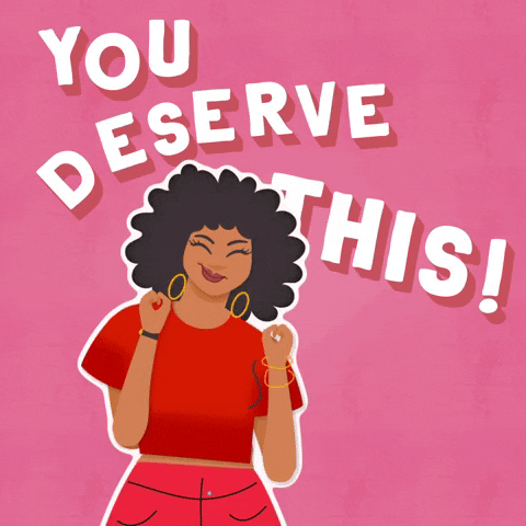 A feminine person in red clothing dances excitedly next to the words, "You deserve this!"