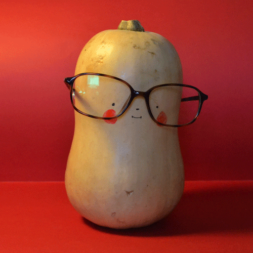 Butternut squash with face and glasses.
