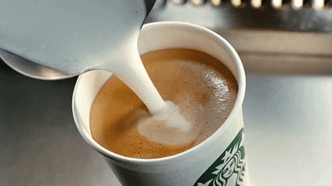 Starbucks latte pour.