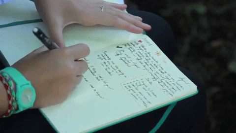 Writing in a journal.