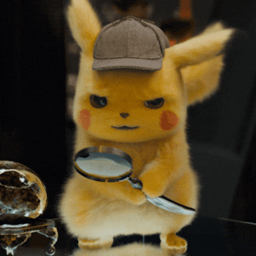 Detective Pikachu raising magnifying glass to his eye.