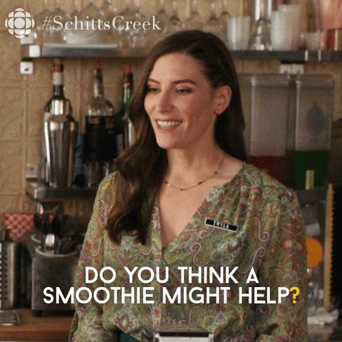 A woman dressed in a floral top is asking "Do you think a smoothie might help?