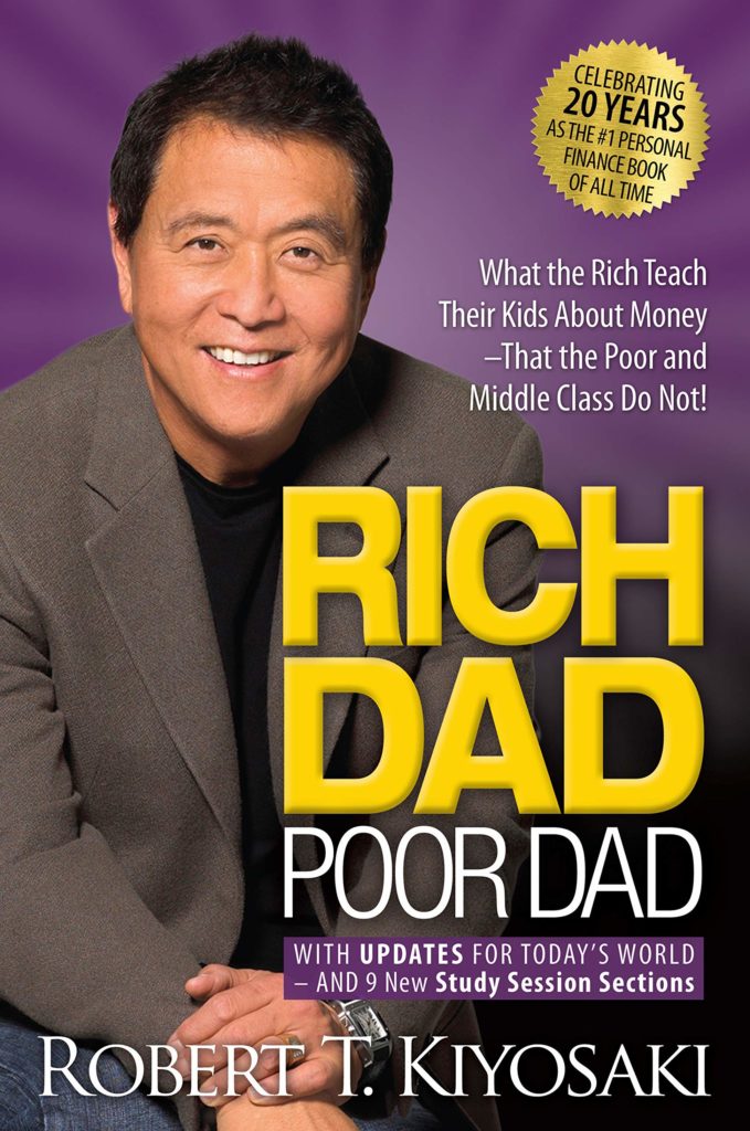 Robert is dressed in a suit and featured on his book cover. The title is "Rich Dad, Poor Dad".