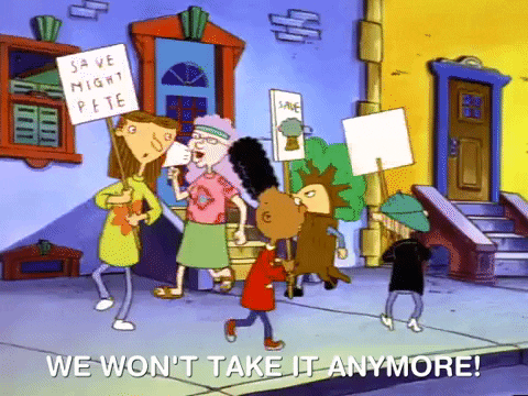 Characters from the cartoon Hey Arnold are marching in a circle holding signs while shouting "We won't take it anymore." (Need or Greed)

Protesting Hey Arnold GIF