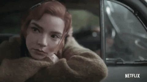 Beth from the "Queen's Gambit" is in a moving vehicle with her head outside the window.

The Queens Gambit GIF