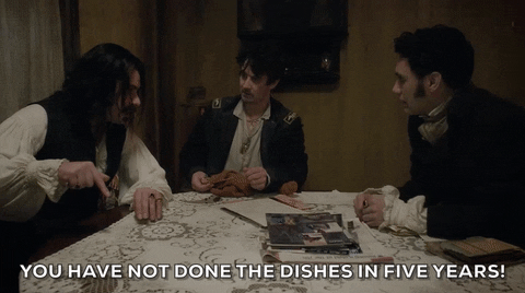 A man with long hair is shouting "You have not done the dishes in five years!"

Jemaine Clement Roommate GIF 

