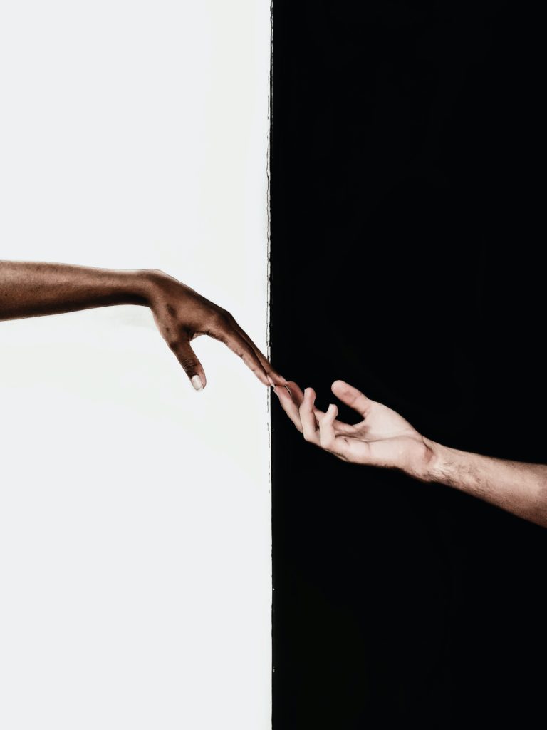 two hands with black and white background