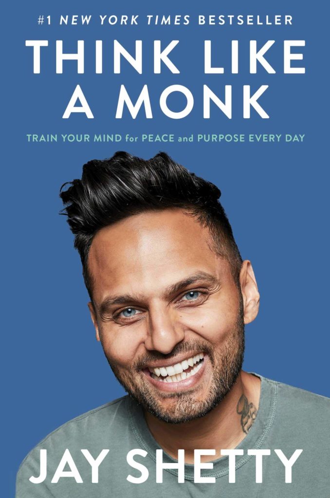 Jay Shetty is smiling on his book cover (Think like a monk). (Humber library)
