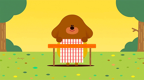 Animated dog setting up a picnic table. 