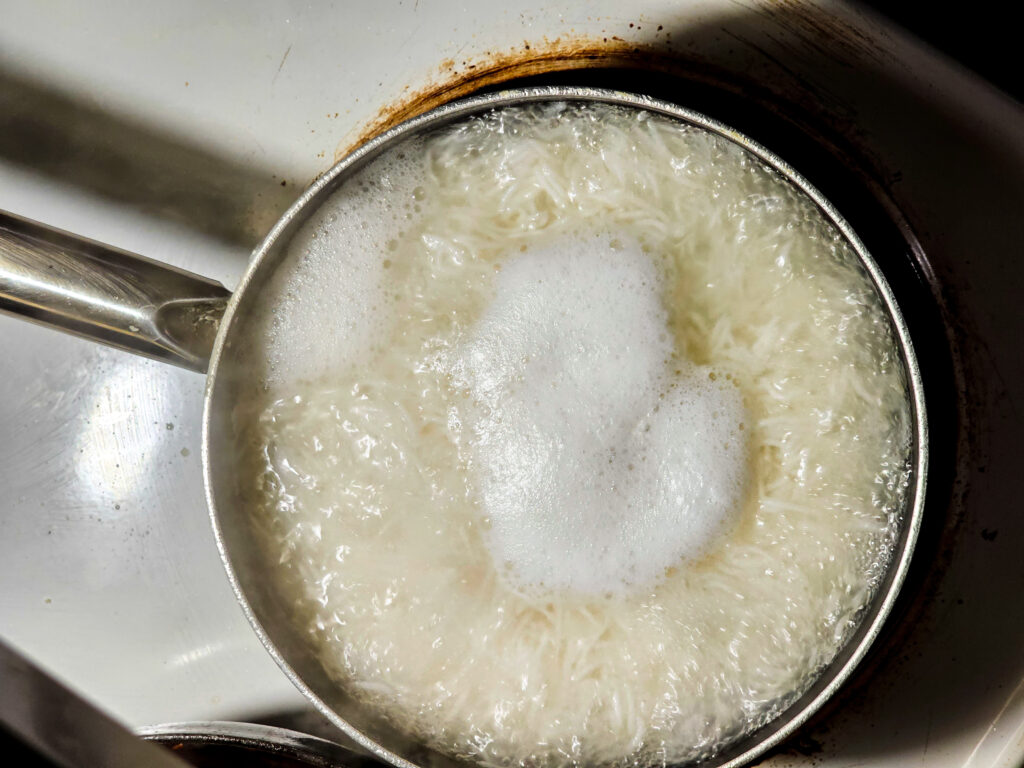 Rice boiling in a pot