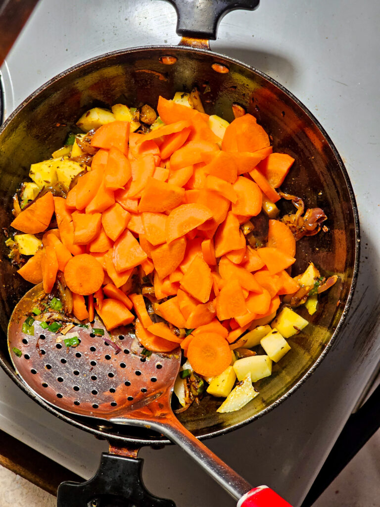 carrots added to a pan