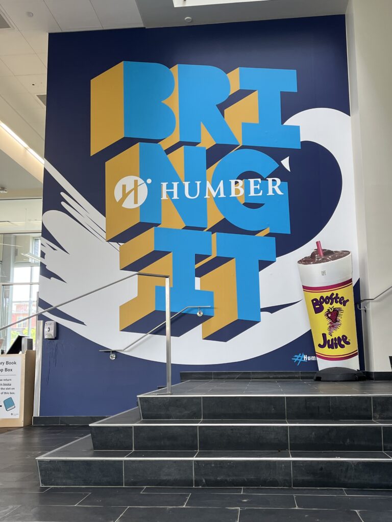 A photo of the Humber "Bring it" graphic art mural at the LRC at Lakeshore.