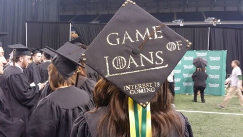A graduate is wearing a custom hat that says "Game of loans, interest is coming soon." (Internet)