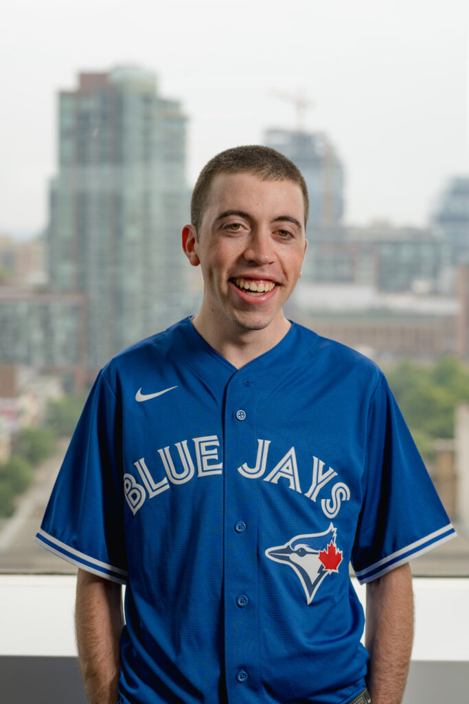 Aaron Posner in a blue jays shirt