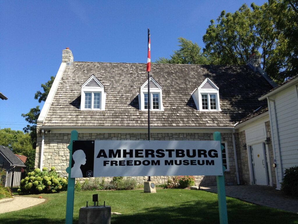 A picture of the Amherstburg Freedom Museum. The museum looks similar to a house.
