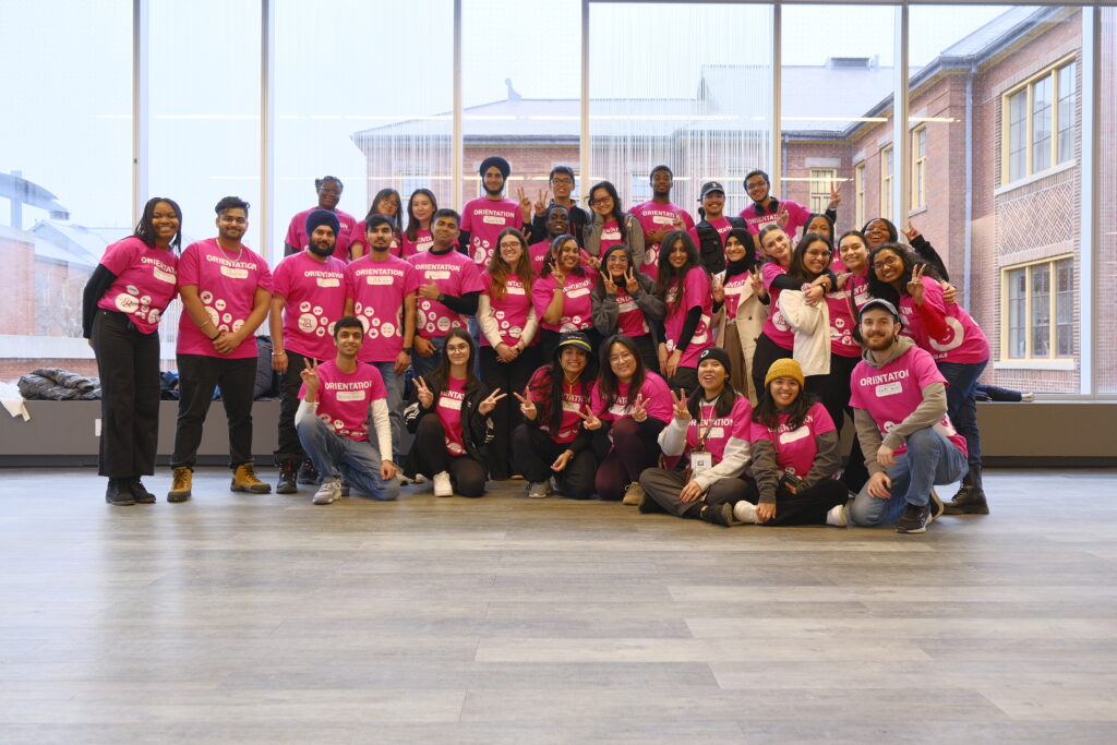 Picture of volunteers wearing pink shirt demonstrating leadership initiatives