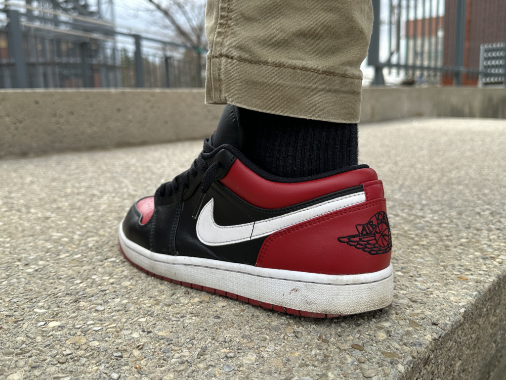 Picture of a Nike Air Jordan 1 Low black/white - gym red.